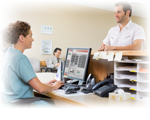 A guest signing in at a hospital Visitor Management installation